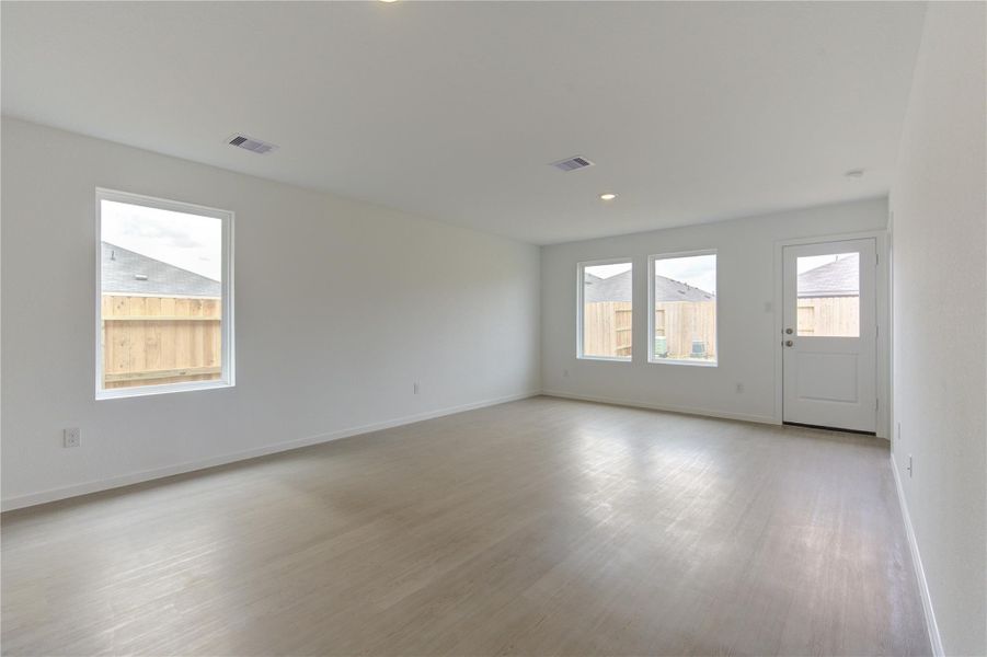 Seamless flow between living, dining, and kitchen areas