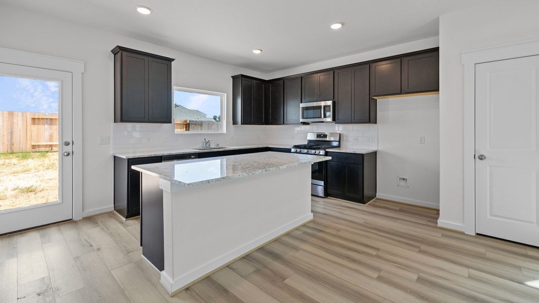 Furnished interior view inside a new home in Cielo, Conroe (Image 10).