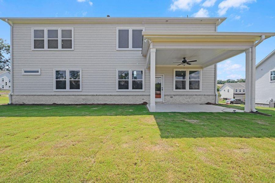 Exterior details and patio area of a home in Stratford Hills, Ball Ground (Image 2).