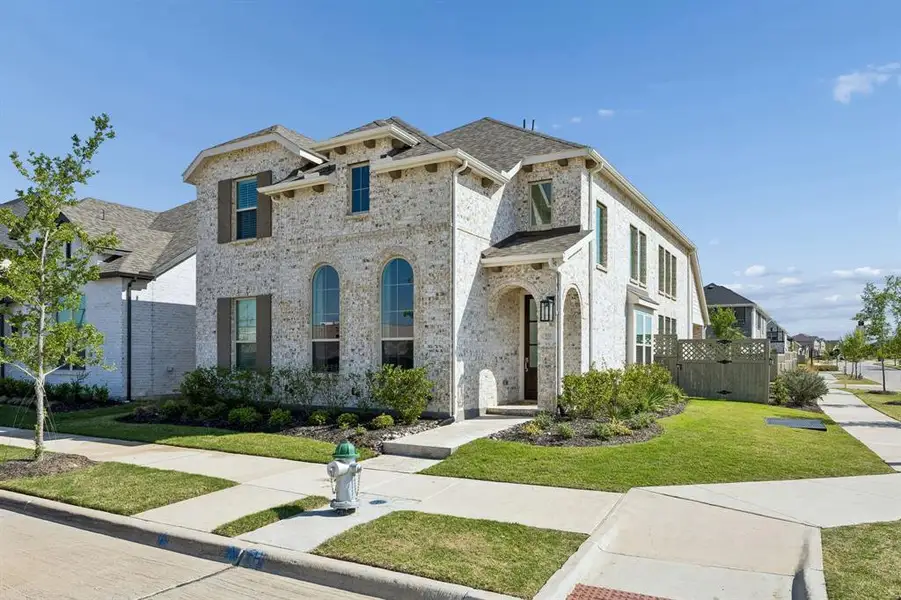 Front exterior of a new home in , Northlake, TX, highlighting curb appeal (Image 2). Front exterior of a new home in , Northlake, TX, highlighting curb appeal (Image 2).