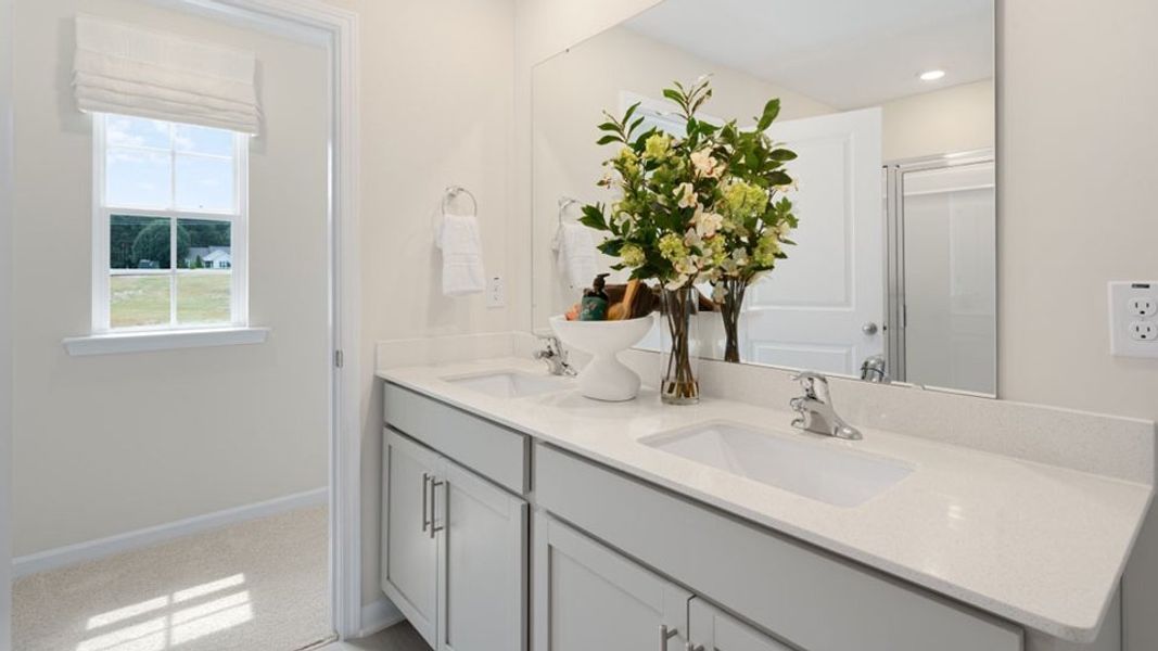 Representative furnished interior of a home built from the HAYDEN by D.R. Horton in Mason Ridge, Spring Lake (Image 33).