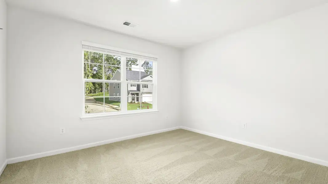 Spacious, unfurnished interior of a new home in Neal Place, Stokesdale (Image 18).