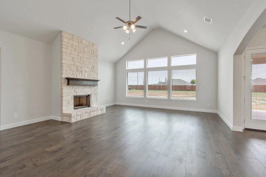 Family Room | Concept 2797 at Hidden Creek Estates in Van Alstyne, TX by Landsea Homes