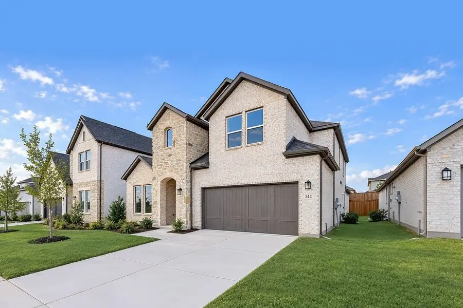 Front exterior of a new home in South Oak, Lakewood Village, TX, highlighting curb appeal (Image 18).