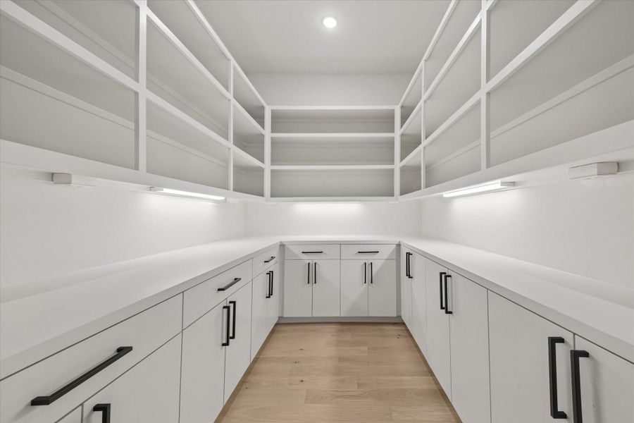 The 7x9 walk-in food pantry has a smart custom configuration for all storage needs.