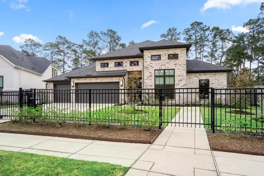 Front exterior of a new home in Audubon, Magnolia, TX, highlighting curb appeal (Image 2).
