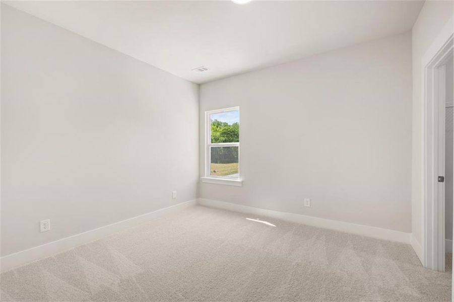Spacious, unfurnished interior of a new home in Traditions of Braselton, Jefferson (Image 31).