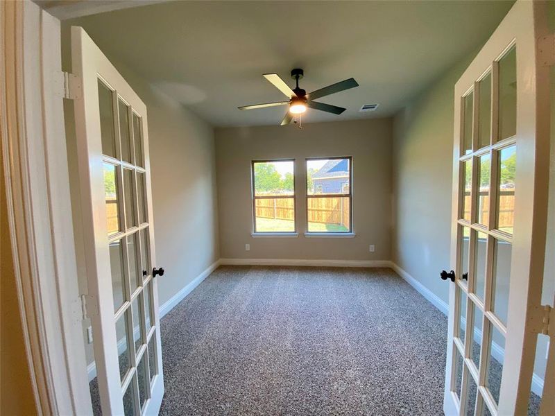 Large study with French doors & ceiling fan Large study with French doors & ceiling fan