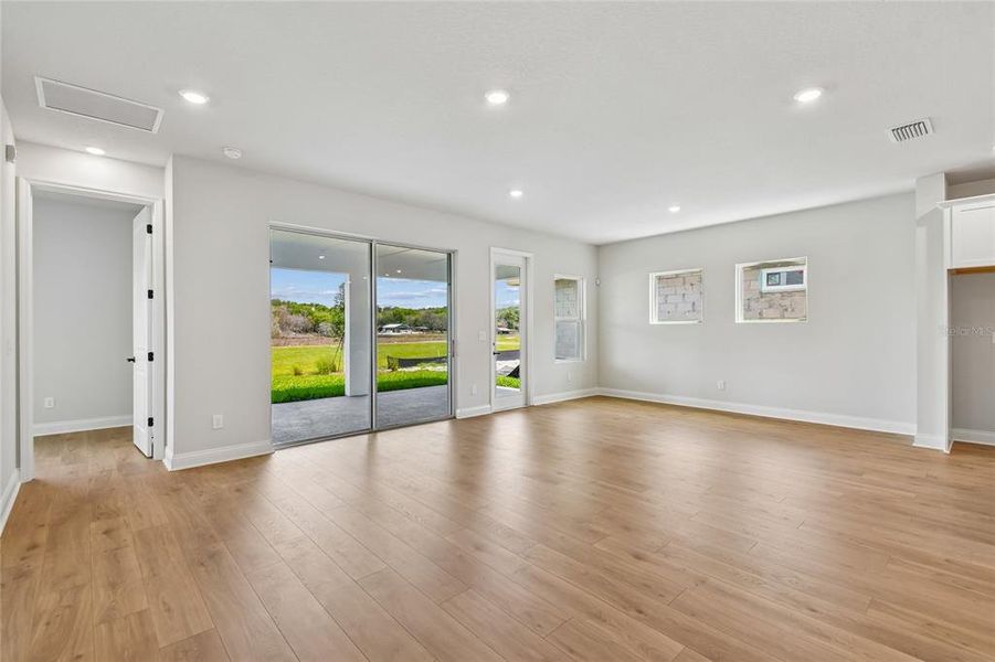 Spacious, unfurnished interior of a new home in Oakfield at Mount Dora Village Series, Mount Dora (Image 33).