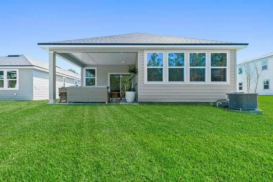 Exterior details and patio area of a home in , Palm Coast (Image 3). Exterior details and patio area of a home in , Palm Coast (Image 3).