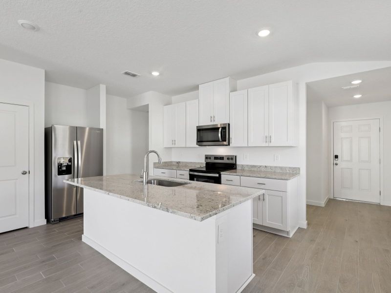Furnished interior view inside a new home in Kings Creek - Classic Series, Jacksonville (Image 3).