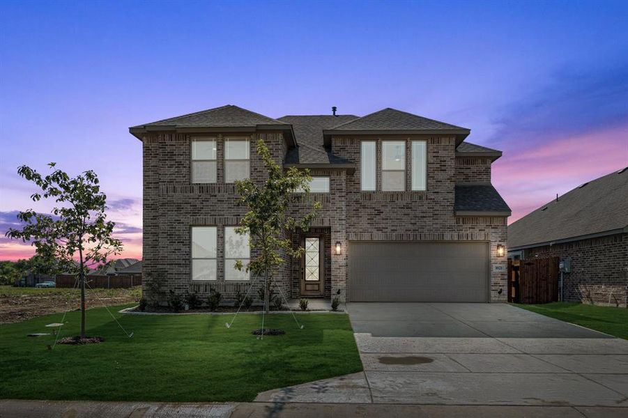 Front exterior of a new home in Star Ranch Classic 50, Godley, TX, highlighting curb appeal (Image 23). Front exterior of a new home in Star Ranch Classic 50, Godley, TX, highlighting curb appeal (Image 23).