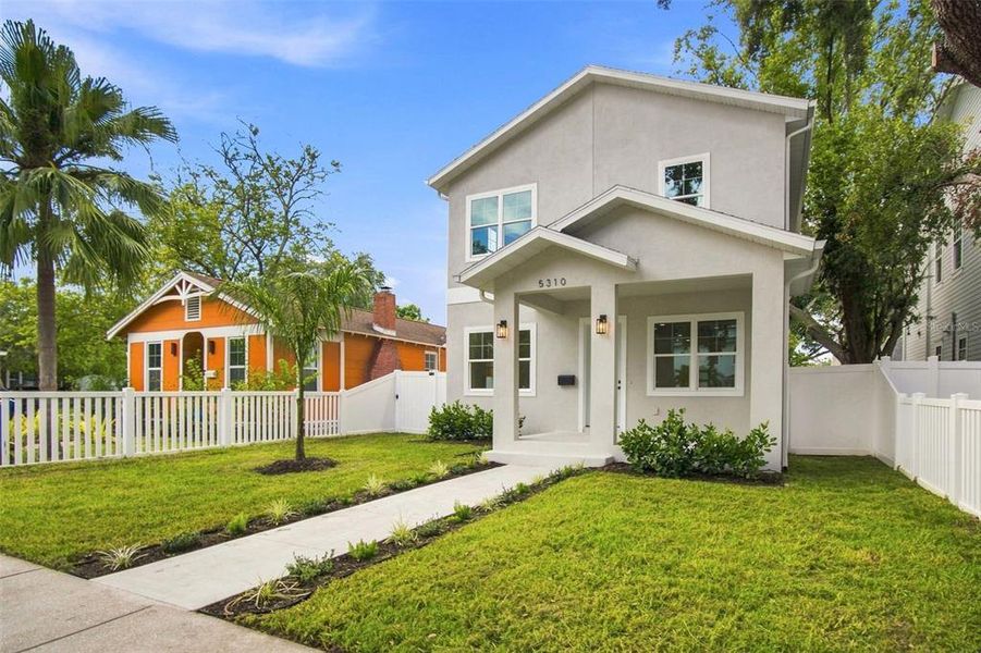 Front exterior of a new home in , St. Petersburg, FL, highlighting curb appeal (Image 32). Front exterior of a new home in , St. Petersburg, FL, highlighting curb appeal (Image 32).