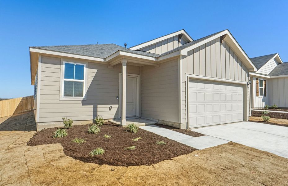 Front exterior of a new home in Larson Crossing, Elgin, TX, highlighting curb appeal (Image 20).