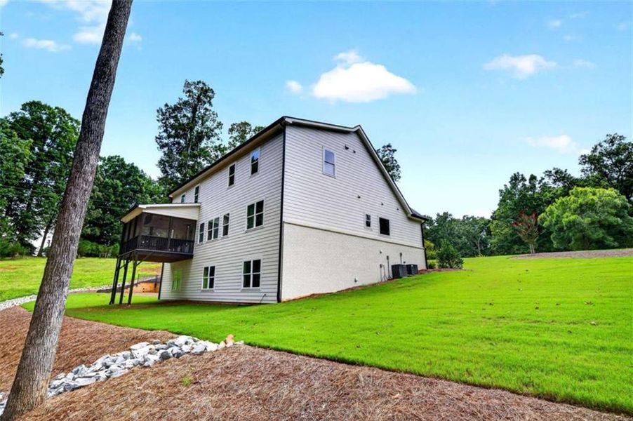 Exterior details and patio area of a home in , Hoschton (Image 40).