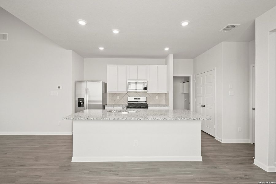 Furnished interior view inside a new home in Hickory Ridge, Elmendorf (Image 9).