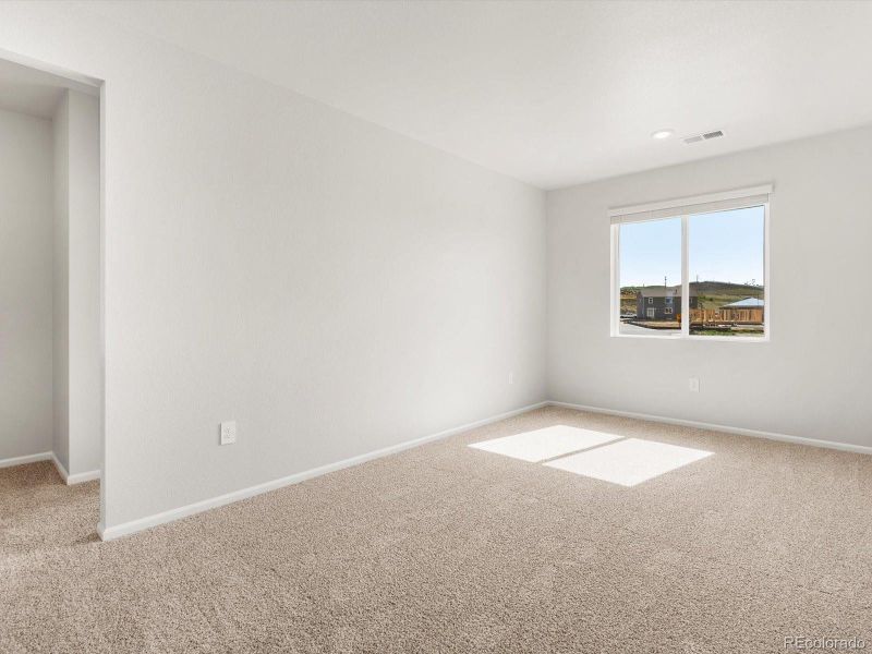 Spacious, unfurnished interior of a new home in Poudre Heights: The Alpine Collection, Windsor (Image 33).