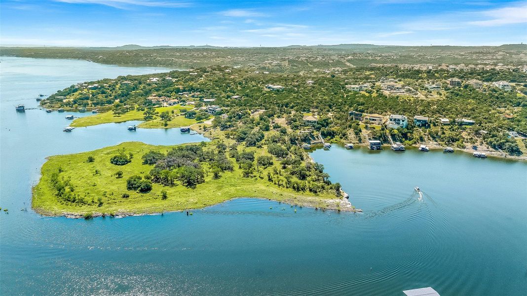 The gorgeous property is positioned along the protected banks of Bee Creek Cove.