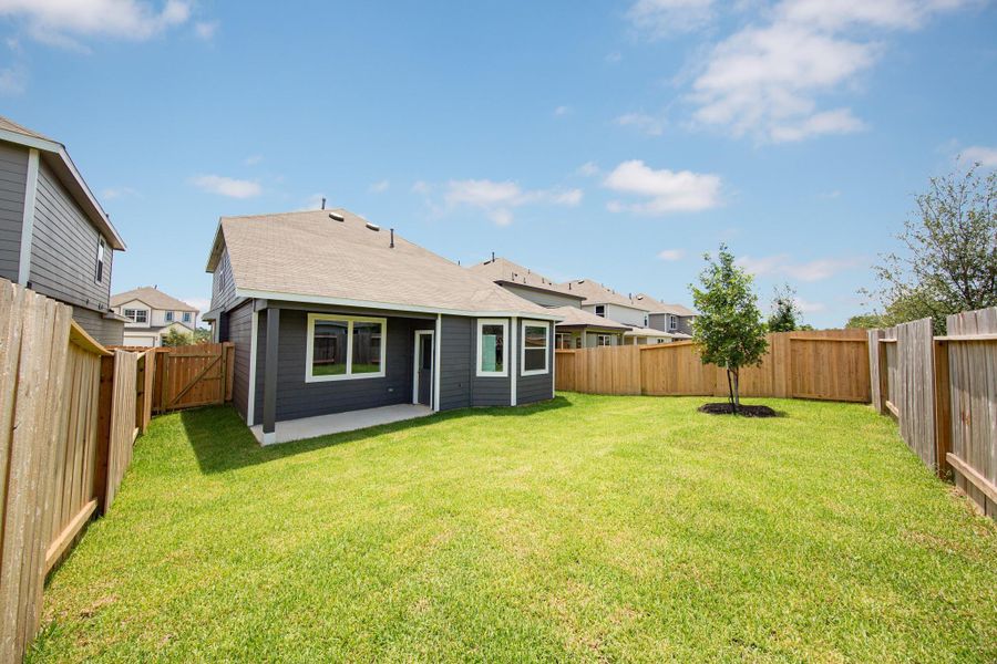 Front exterior of a new home in Cliffstone Hills, Conroe, TX, highlighting curb appeal (Image 2). Front exterior of a new home in Cliffstone Hills, Conroe, TX, highlighting curb appeal (Image 2).