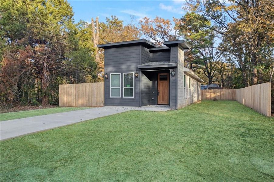 View of front of home with a front lawn