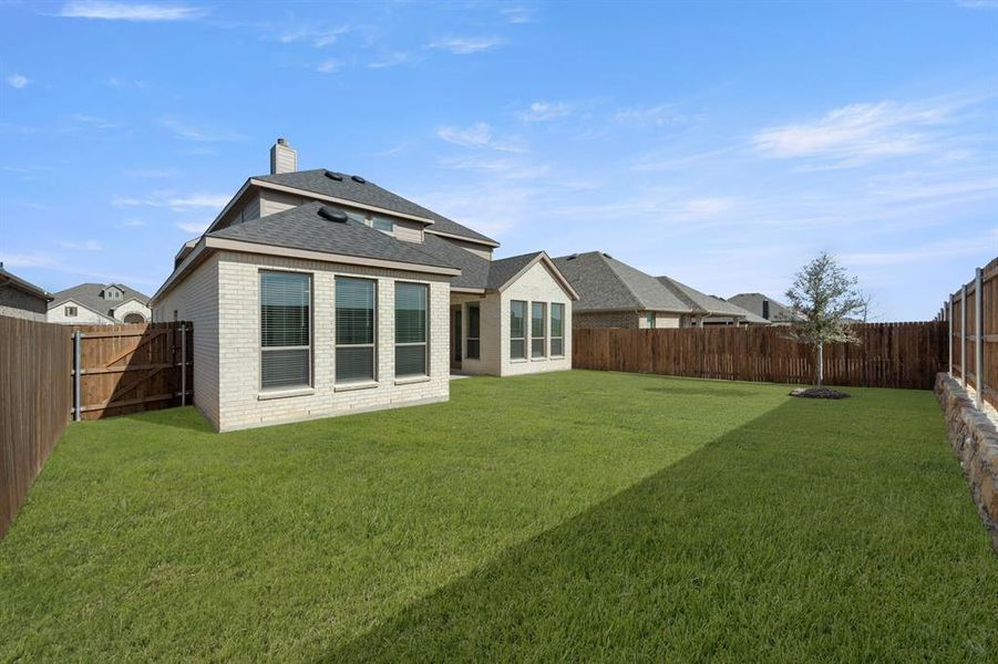 Exterior details and patio area of a home in The Retreat - Phase 1, Waxahachie (Image 20).