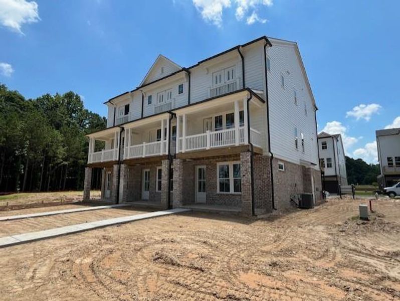 Front exterior of a new home in The Village at River Green, Canton, GA, highlighting curb appeal (Image 5).