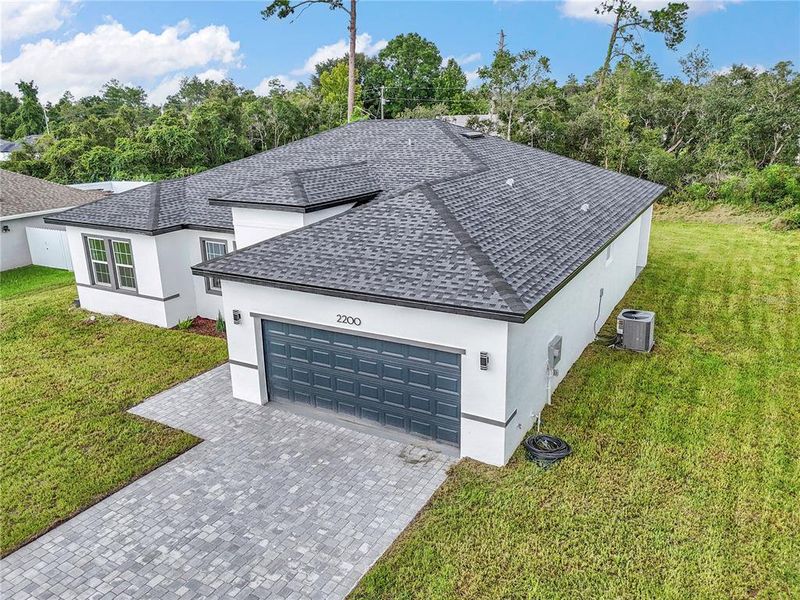 Front exterior of a new home in , Ocala, FL, highlighting curb appeal (Image 22).