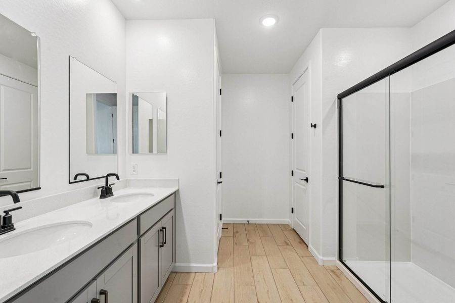 Primary bath. Finishes and options may vary by community