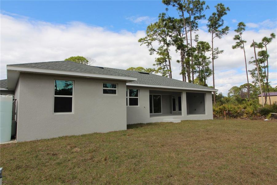 Exterior details and patio area of a home in , Port Charlotte (Image 3).
