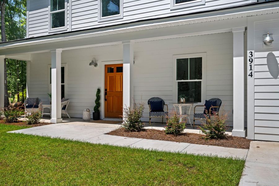 Exterior details and patio area of a home in , Johns Island (Image 26).