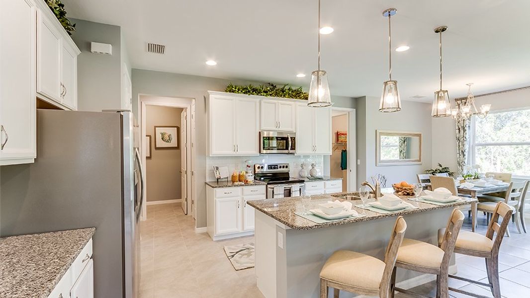 Representative furnished interior of a home built from the Jaden by D.R. Horton in South Gulf Cove, Port Charlotte (Image 10).