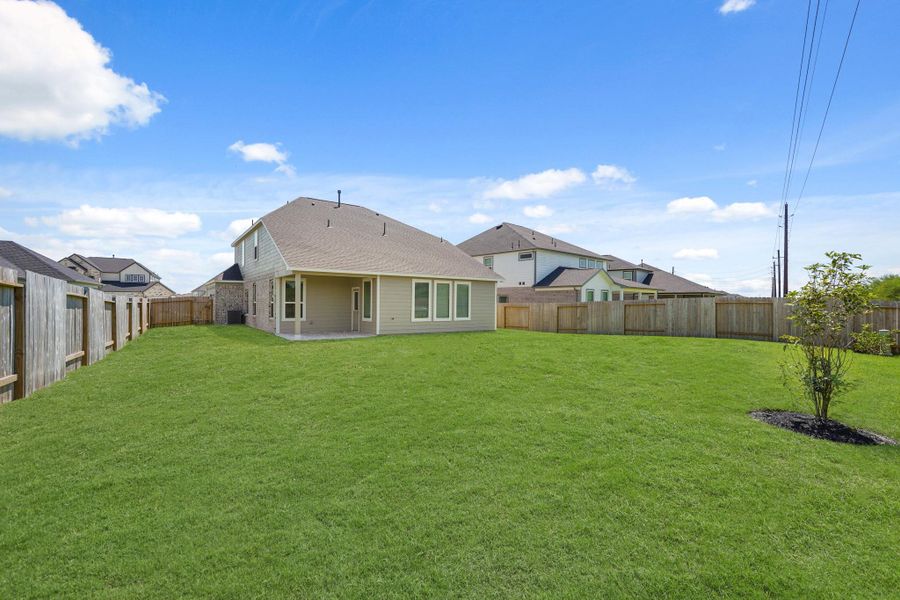Front exterior of a new home in Briarwood Crossing, Rosenberg, TX, highlighting curb appeal (Image 18). Front exterior of a new home in Briarwood Crossing, Rosenberg, TX, highlighting curb appeal (Image 18).