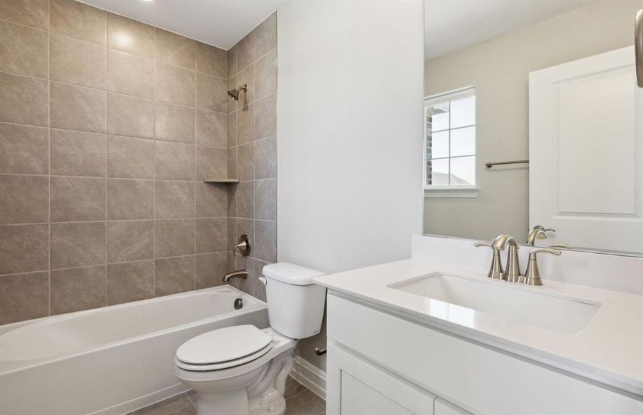 Upgraded secondary bathroom*real home pictured