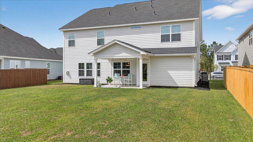 Exterior details and patio area of a home in Hewing Farms, Summerville (Image 3).