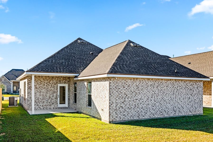 Exterior details and patio area of a home in The Bluffs at Lafayette, Freeport (Image 3).