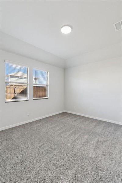 Primary Suite in the Cedar home plan by Trophy Signature Homes – REPRESENTATIVE PHOTO