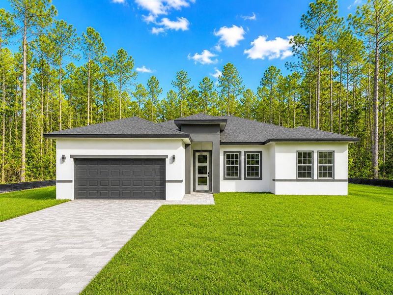 Front exterior of a new home in , Ocala, FL, highlighting curb appeal (Image 20). Front exterior of a new home in , Ocala, FL, highlighting curb appeal (Image 20).
