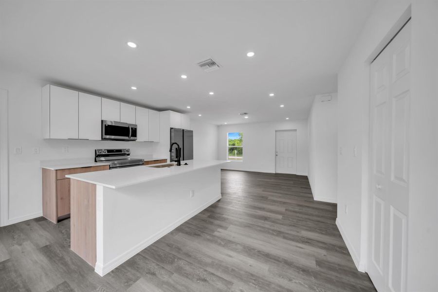 Furnished interior view inside a new home in , Lehigh Acres (Image 7). Furnished interior view inside a new home in , Lehigh Acres (Image 7).