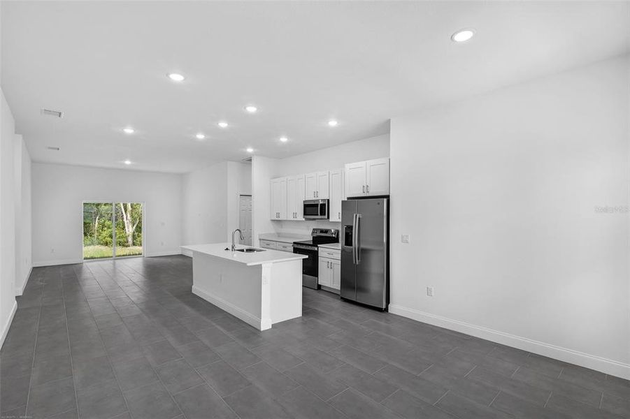 Furnished interior view inside a new home in , Dunnellon (Image 5).