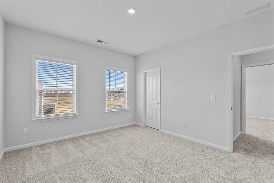 Spacious, unfurnished interior of a new home in Lilah Grove, Summerfield (Image 45).