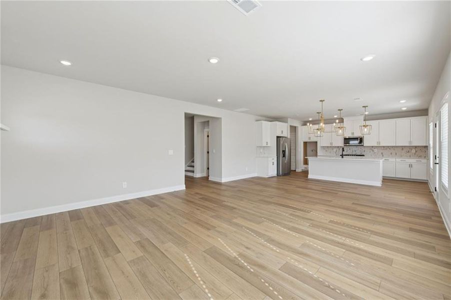 Spacious, unfurnished interior of a new home in Vines at Mill Creek - Estate Series, Braselton (Image 54).