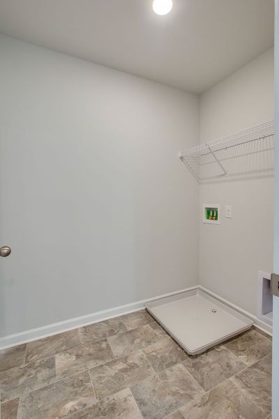 Representative unfurnished interior of a home built from the HAYDEN by D.R. Horton in The Parks, White House (Image 21).