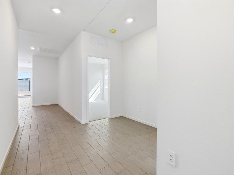 Spacious, unfurnished interior of a new home in Meritage Homes by Teravalis - Estate Series, Buckeye (Image 9).