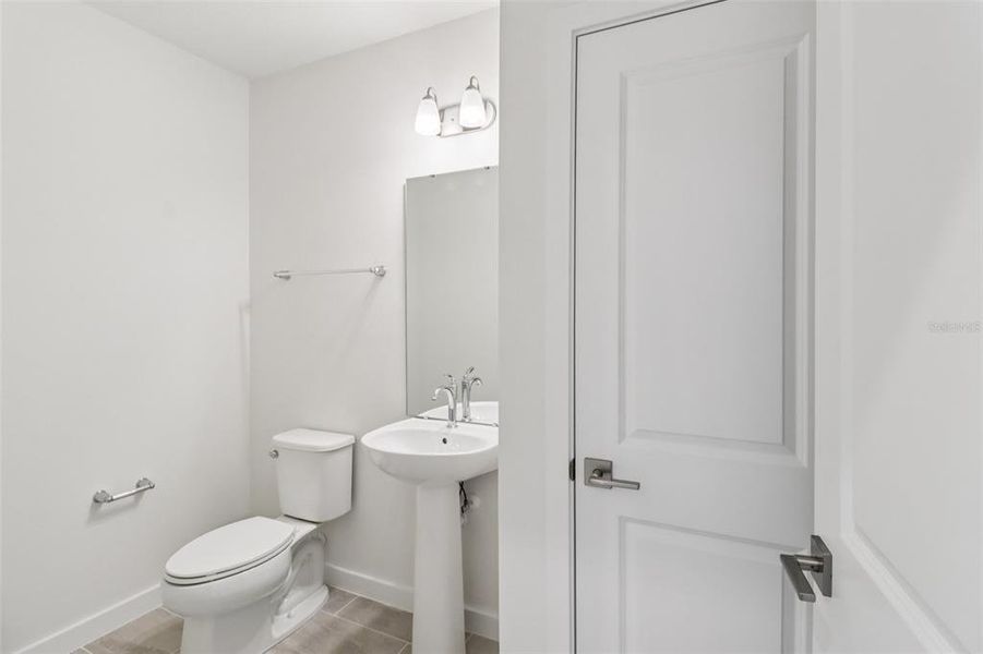 Furnished interior view inside a new home in Cyrene at Harmony, St. Cloud (Image 7).