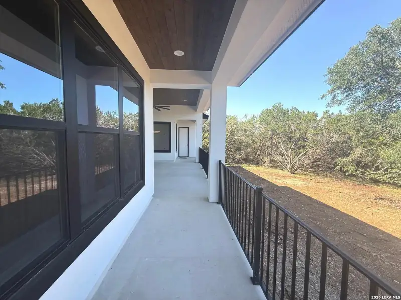 Exterior details and patio area of a home in , Spring Branch (Image 4).