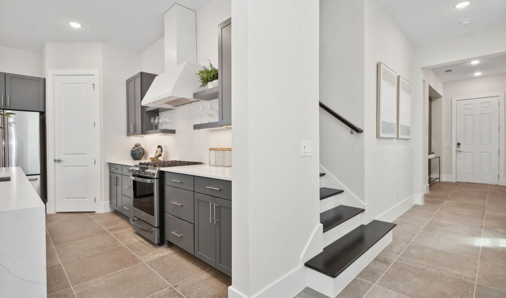 Welcoming foyer leading to kitchen