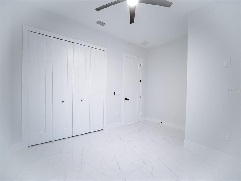 Spacious, unfurnished interior of a new home in , Port Charlotte (Image 35).