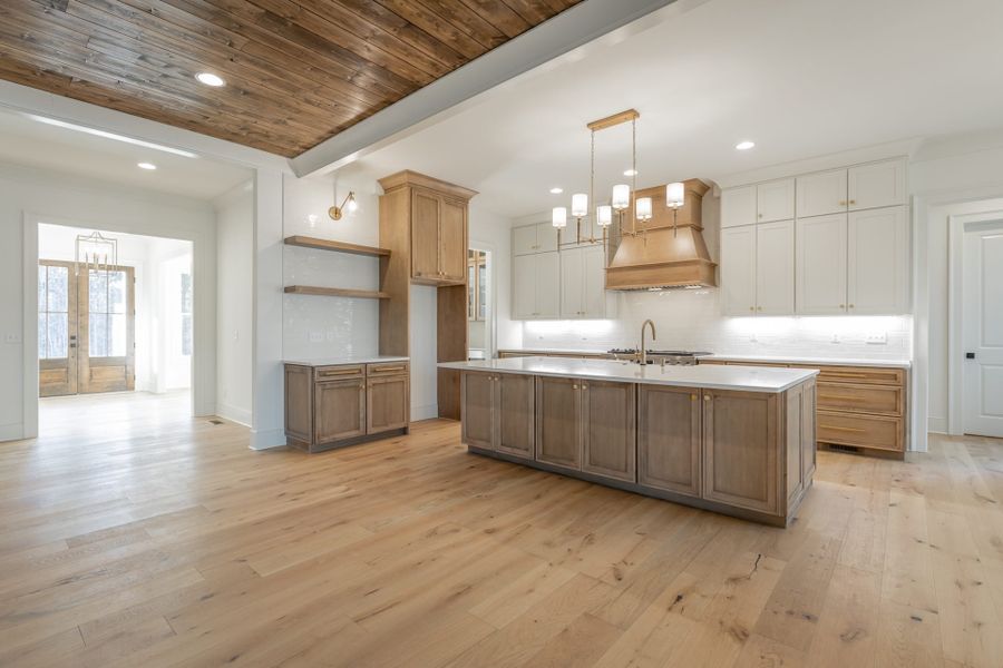 Representative furnished interior of a home built from the Summerbrook by Riverstone Construction, LLC in River Gorge Ranch, River Gorge Ranch (Image 9).
