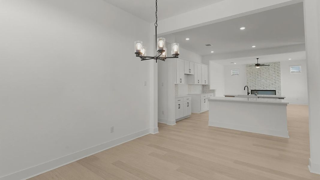Representative unfurnished interior of a home built from the Cornell by Chesmar Homes in Crescent Bluff, Georgetown (Image 14).