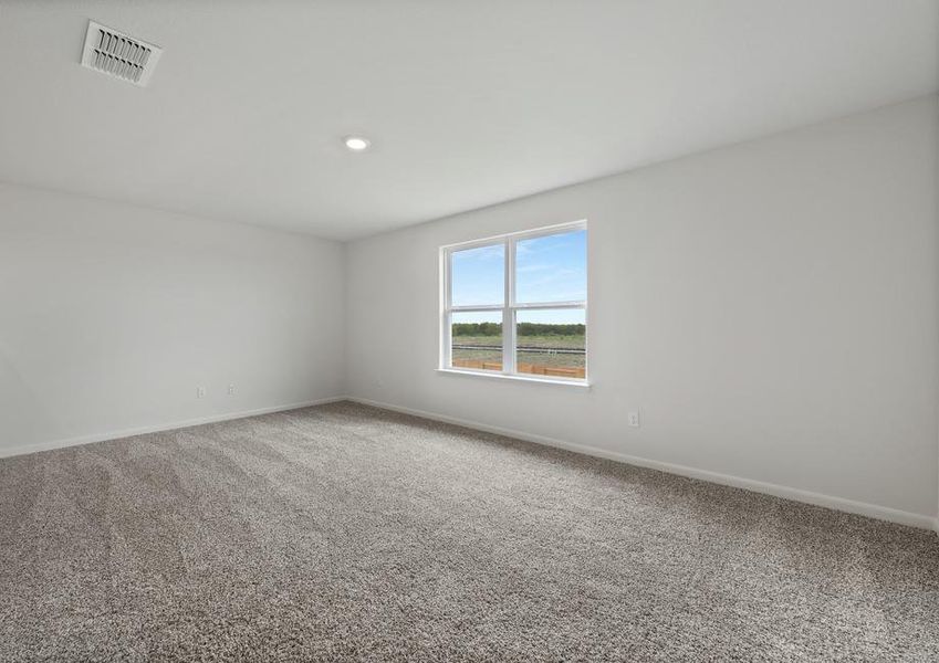 The loft in the Driftwood has a large window and plenty of space for furniture.